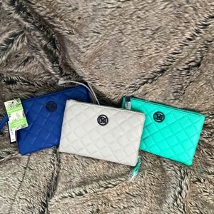 Three different color wallets/purses